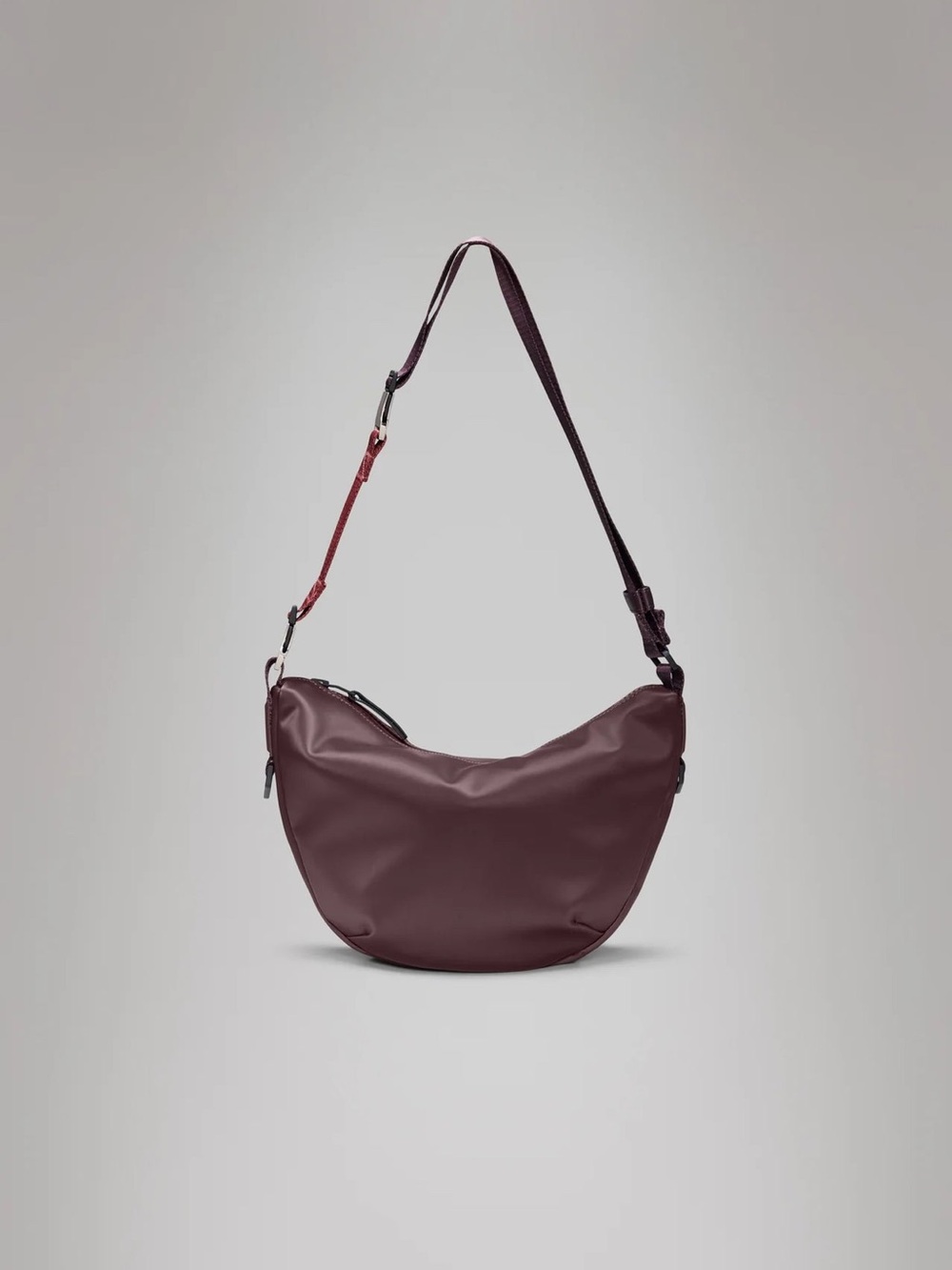 RAINS Valera Waterproof Crescent Shoulder Bag in Deep Burgundy
